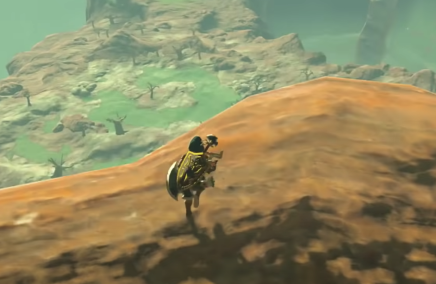 Link shield surfing down a mountain.