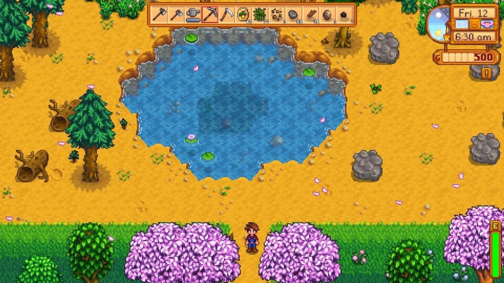The southern exit of your farm in Stardew Valley.