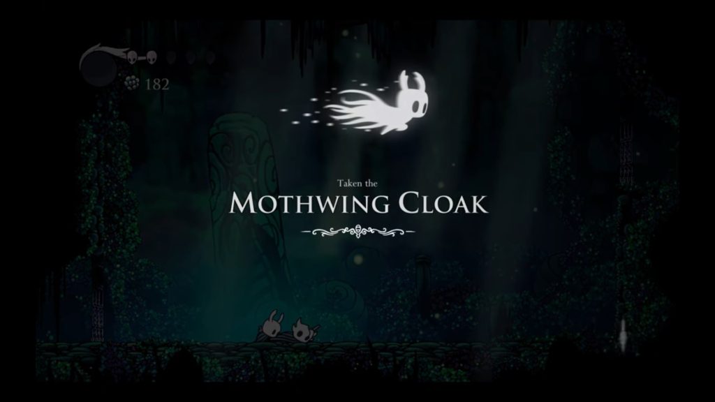 Obtaining the Mothwing Cloak in Hollow Knight.