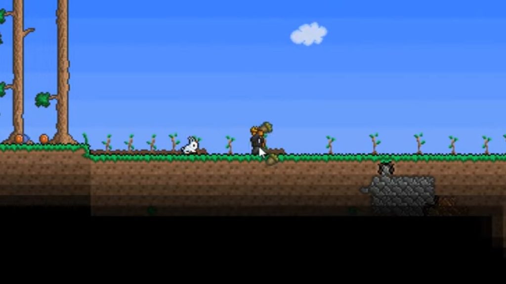 Planting trees in Terraria.