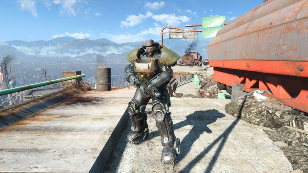 The npc, Clint, wearing t-51 power armor and a cowboy hat while holding a gun.