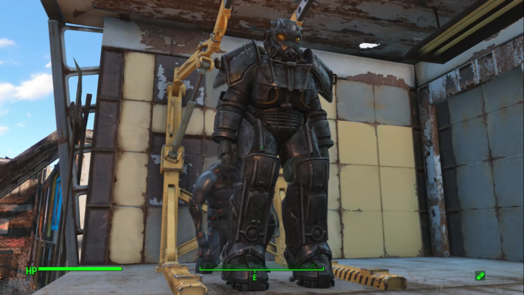 A unique power armor with round yellow eye holes in power armor station.