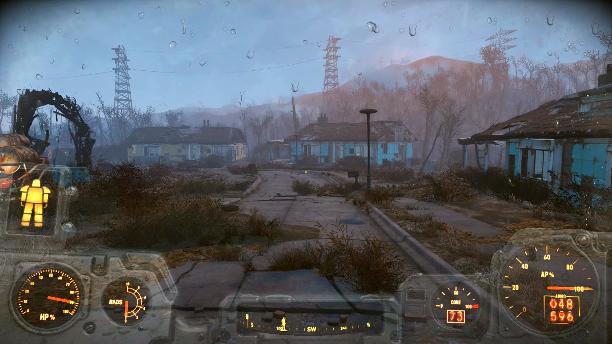 The players view from within a suit of power armor on a rainy day.