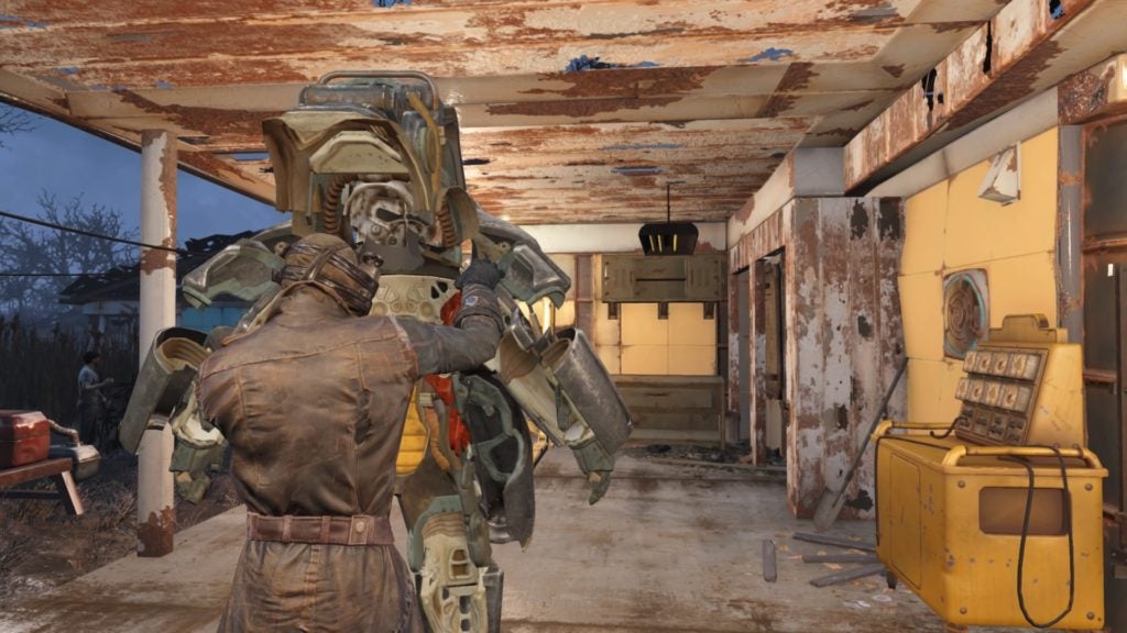 the player getting into their power armor after it opens up in the back, revealing enough space for a human to fit