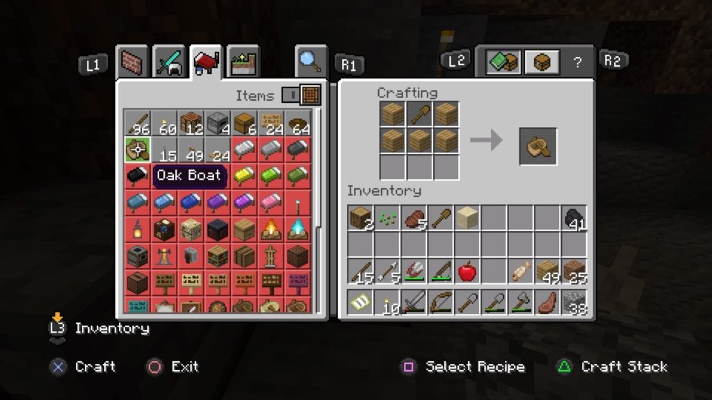 The player using a wood shovel and wood planks to make a boat on a crafting table.