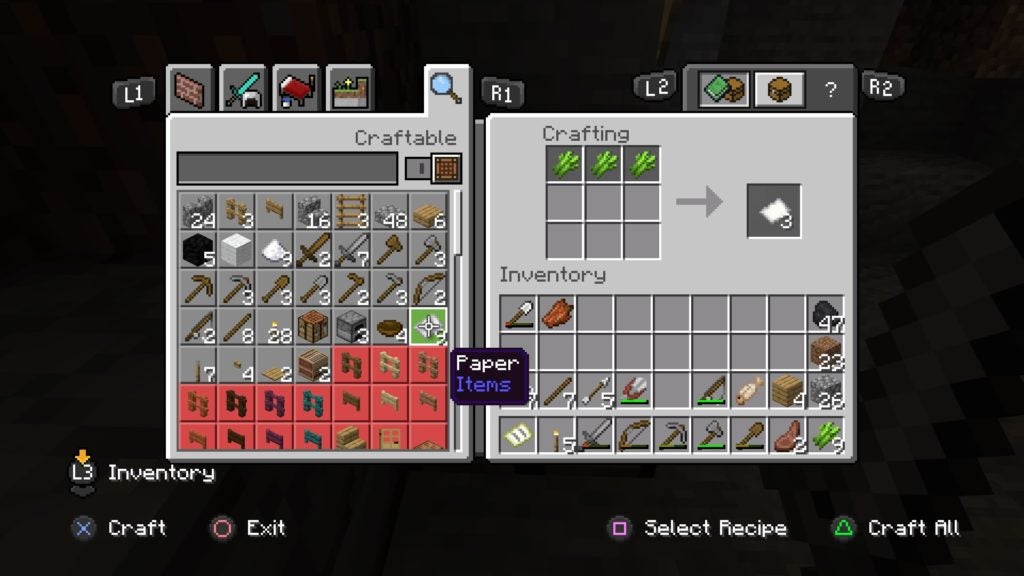 The player using a crafting table to turn 3 pieces of green sugar cane into 3 pieces of paper.