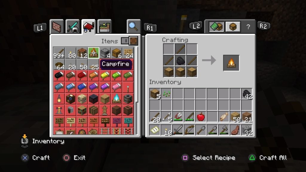 The player making a campfire on a crafting table by using coal, sticks, and wood logs.