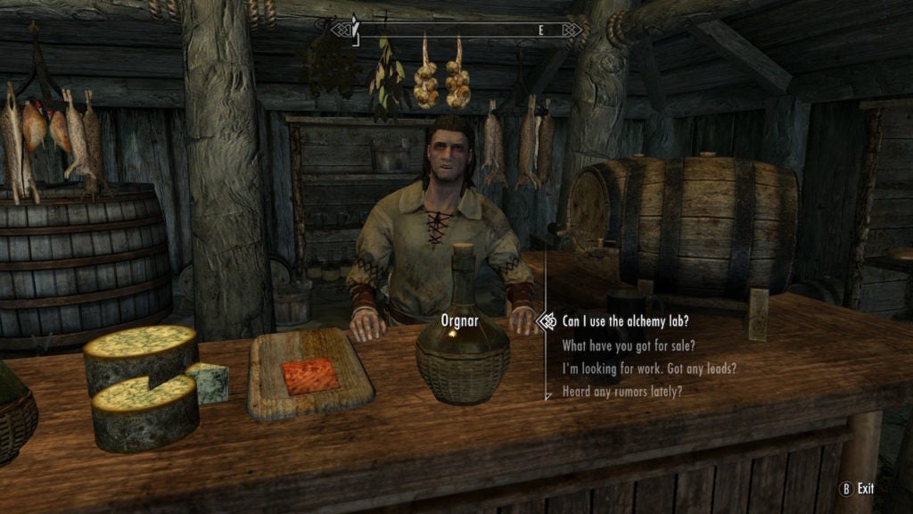 The player is asking the innkeeper about alchemy.