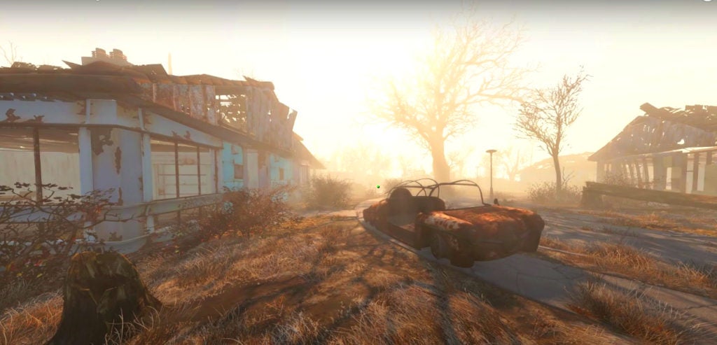 The player looking at a rusty broken car and an old house in first person view with their field of vision set to 120, which shows them more than usual.