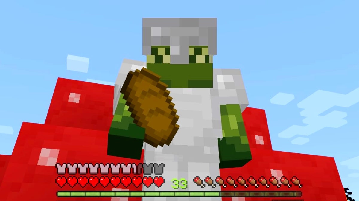 A player in full iron armor holding some bread. They are in third person view and are standing in front of a giant red mushroom.