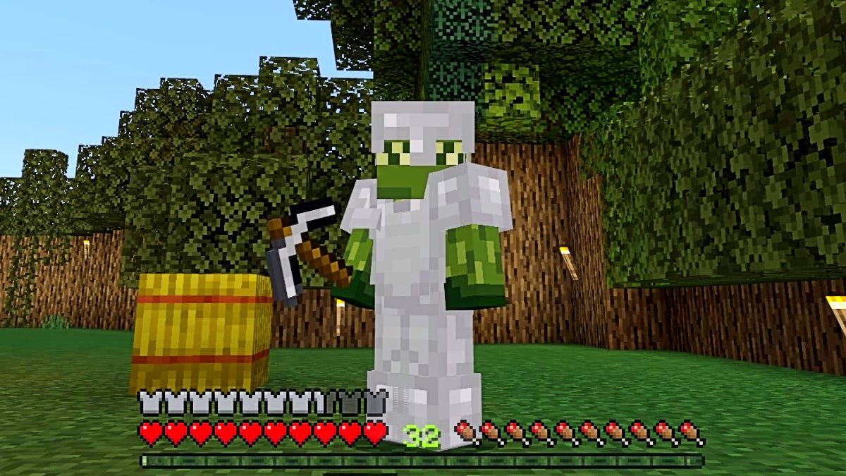 The player in third person view holding an iron pickaxe.