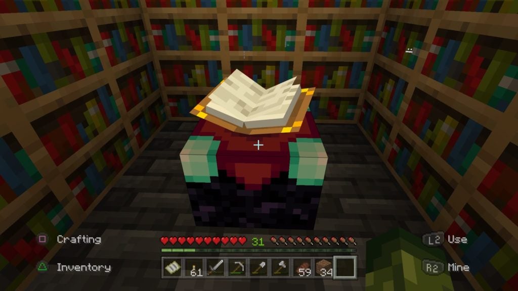 The book floating above the black, cyan, and burgundy enchanting table is open. The enchanting table is on a floor of black tiles and is surrounded by bookshelves.