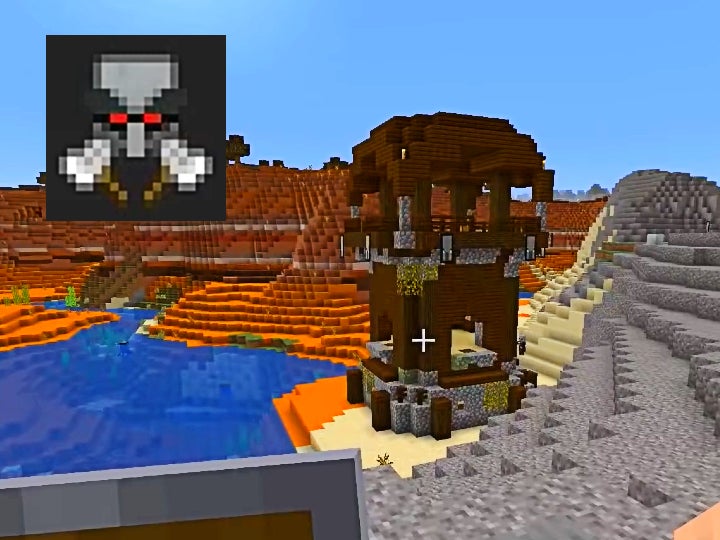 A pillager tower in a badlands biome. The bad omen icon, which is a pillager head with red eyes and 2 axes, is in the top left corner.