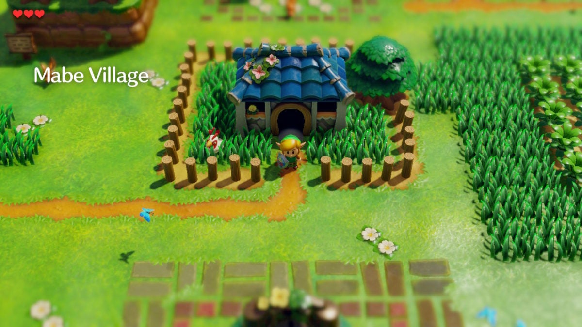 Link standing outside Marin's house in Mabe Village.