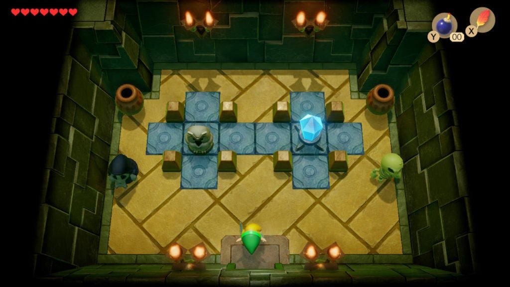 A room with an owl statue and a switch in the center of it. There are 2 enemies as well: 1 Stalfos and 1 Shrouded Stalfos.