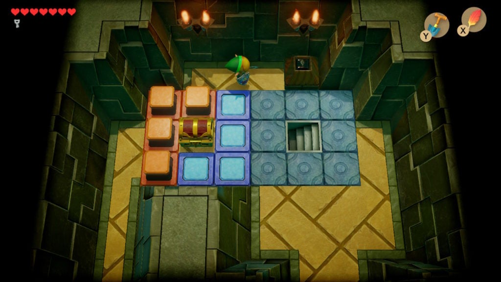 Link about to open a chest now that the blue switch blocks that were blocking it are now down.