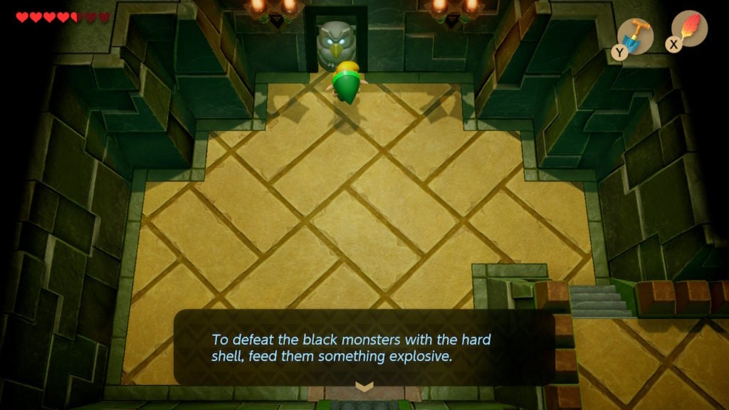 An owl statue giving Link a hint about the mini-boss f the dungeon.