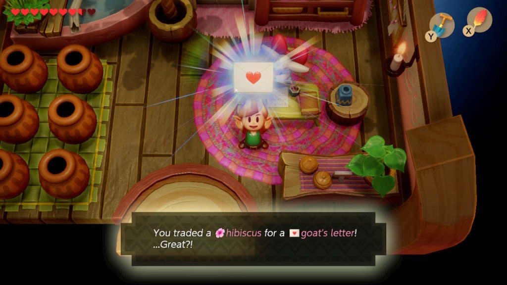 Link holding up a Goat's Letter in Christine's house.