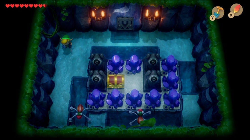 A room with a chest surrounded by purple crystals.