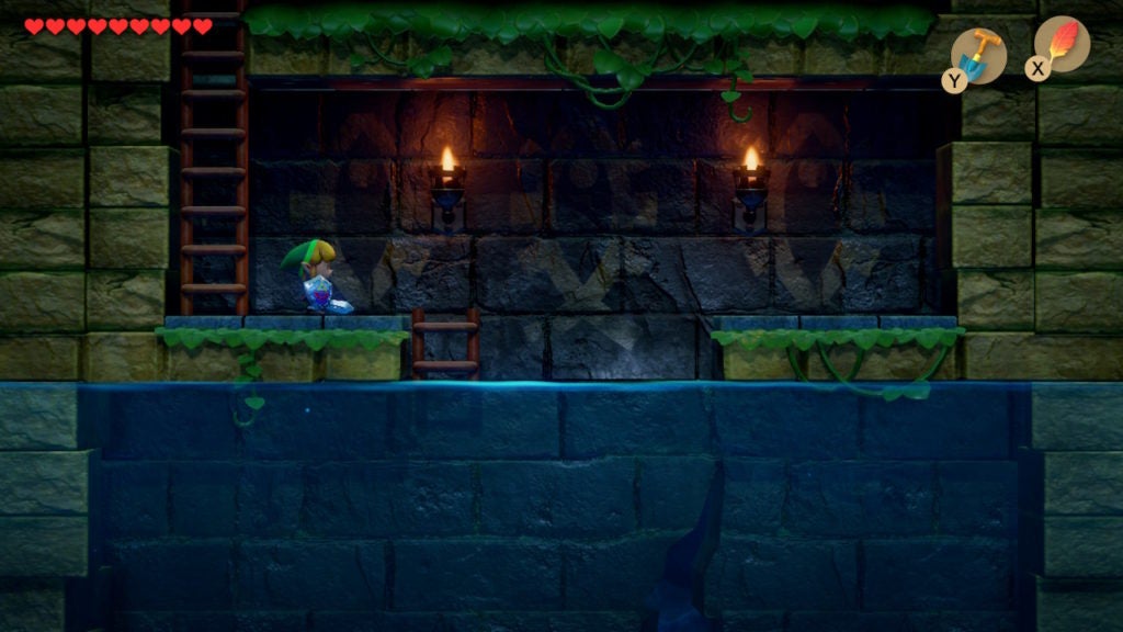 Link in a side-view underground area with a deep pool of water.