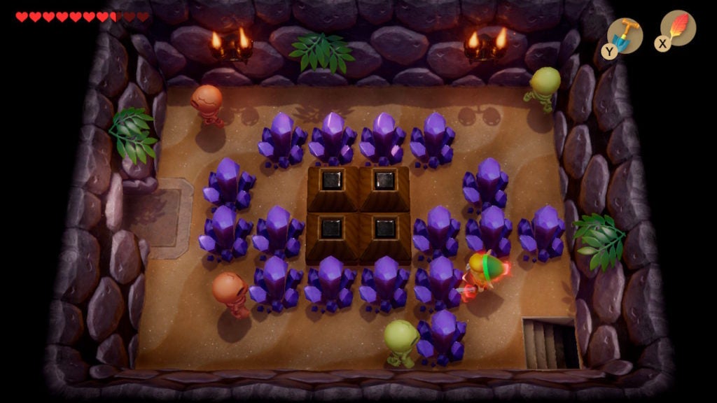 A room with many purple crystals and a square of blocks in the middle.