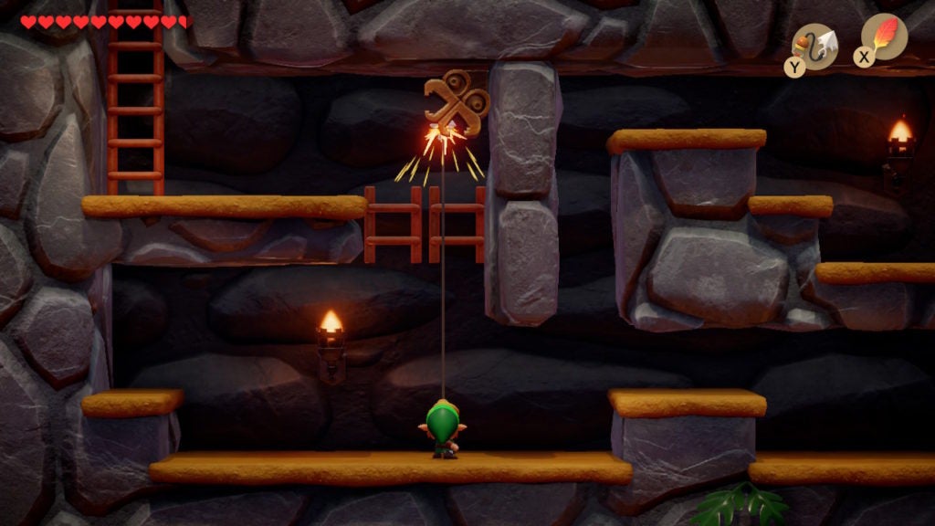 Link using the Hookshot on a grapple point to ascend the west part of a side-view underground tunnel.