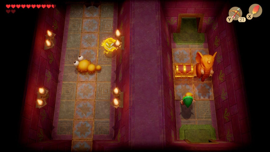 Link in a small room to the east of the frame that holds a chest and 1 elephant statue.