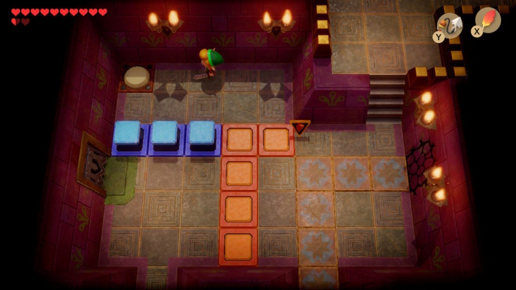 Link looking at a button in the northwest corner of the room above the Switch room.