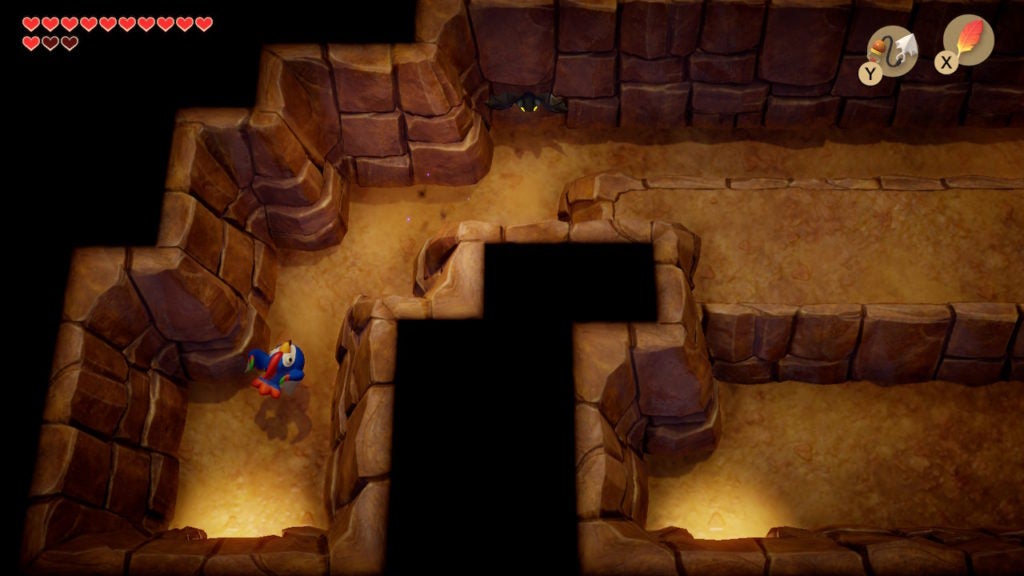 Link and he blue rooster traveling east through a slim cavern.