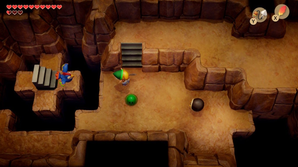 Link and the blue rooster in a large underground room with 1 Green Zol and 1 Hardhat Beetle.