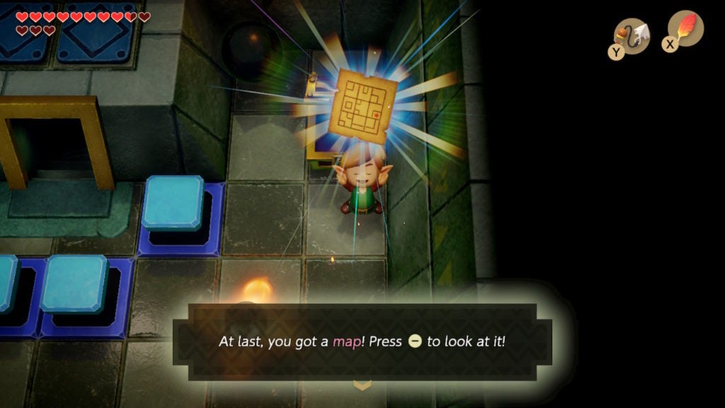 Link holding the Dungeon Map above their head.