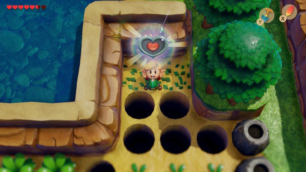 Link holding a heart piece over their head joyfully.