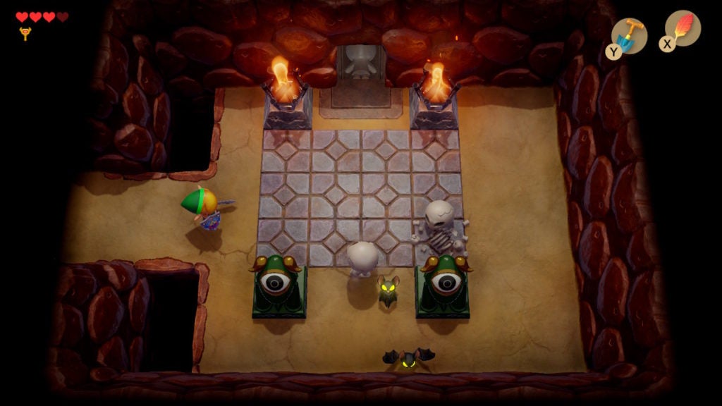 A room with 2 Stalfos and 2 Keese enemies as well as 2 statues and a one-way door.