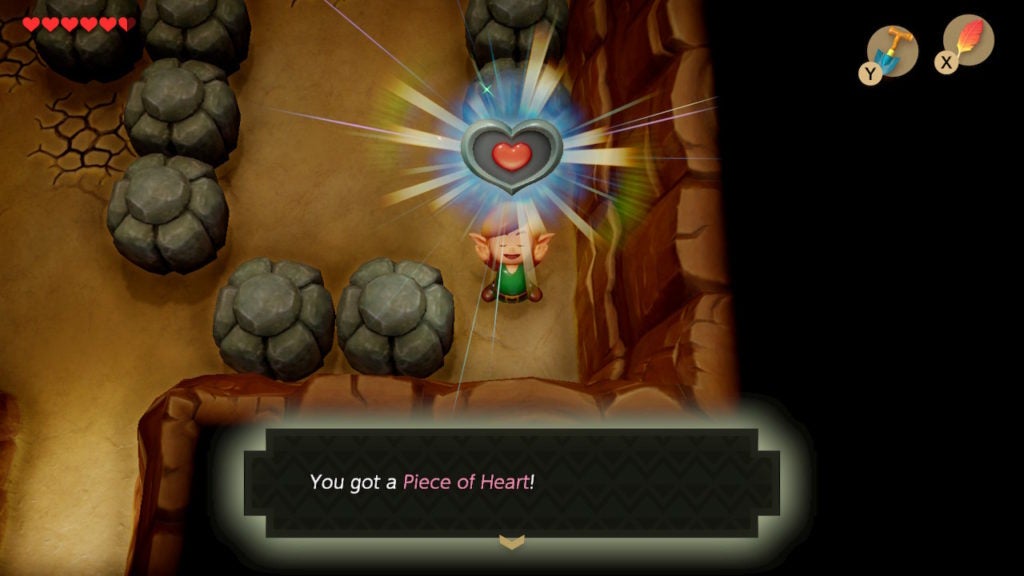 Link has a big smile on his face as he lifts a heart piece into the air.