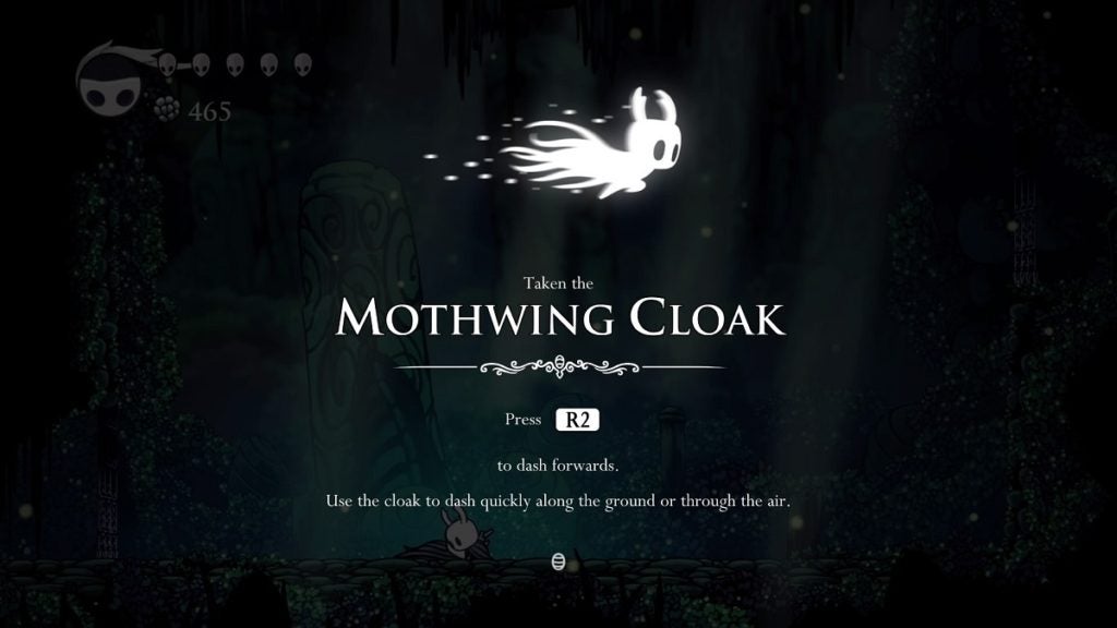 Receiving the Mothwing Cloak in Hollow Knight.