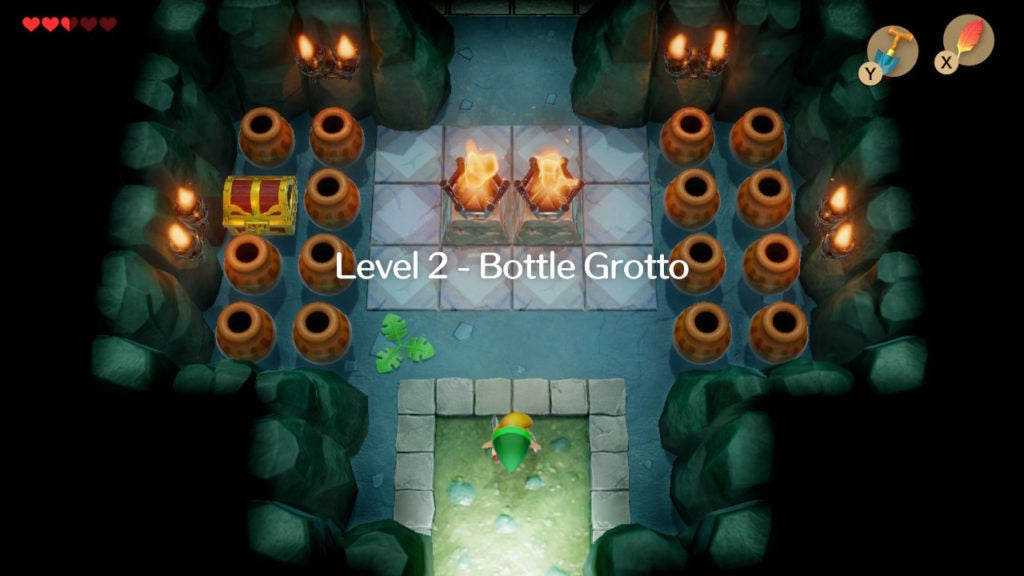The main entrance of the 2nd dungeon in the game with a lot of pots and 1 chest behind a row of pots on the left side.