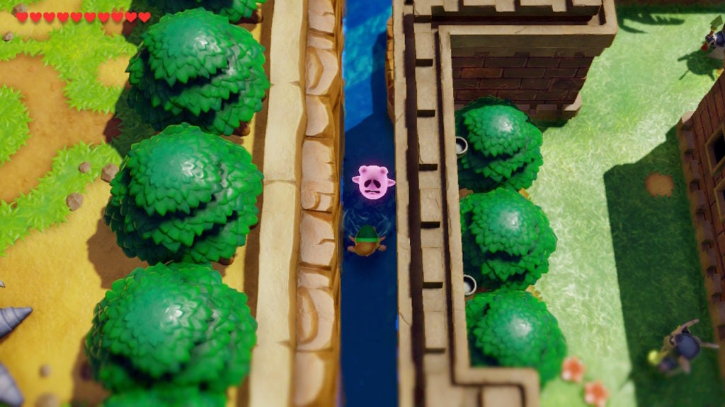 A pink ghost flying up to Link as he swims in the moat west of Kanalet Castle.