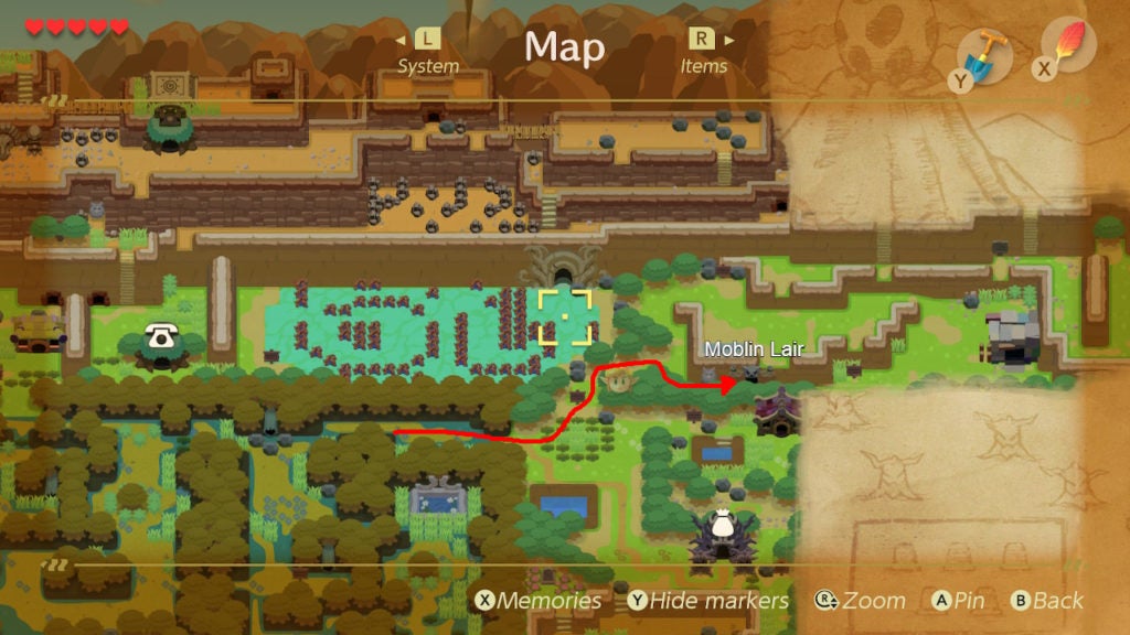Red arrow on map showing how to get from the east of the mysterious forest to the moblin lair.