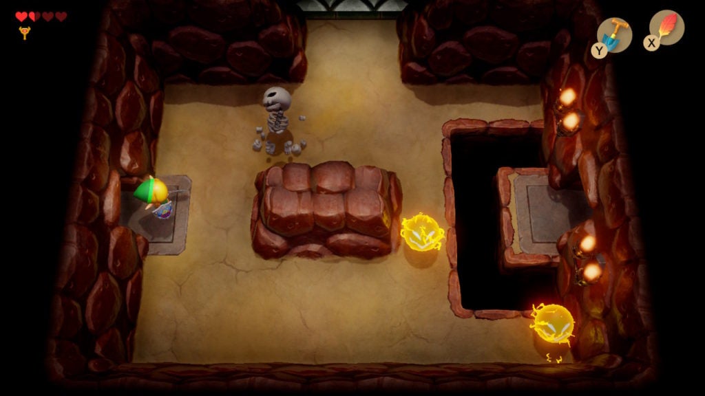 A room with 1 stalfos and 2 spark enemies as well as a c-shaped hole between the center and the east exit.