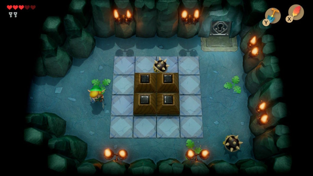 Room with 4 blocks in the center, 2 spiked beetle enemies, and a locked door.