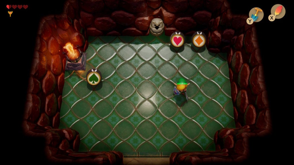 Room with a unique green tiled-floor, and owl statue, and 3 three-of-a-kind enemies.