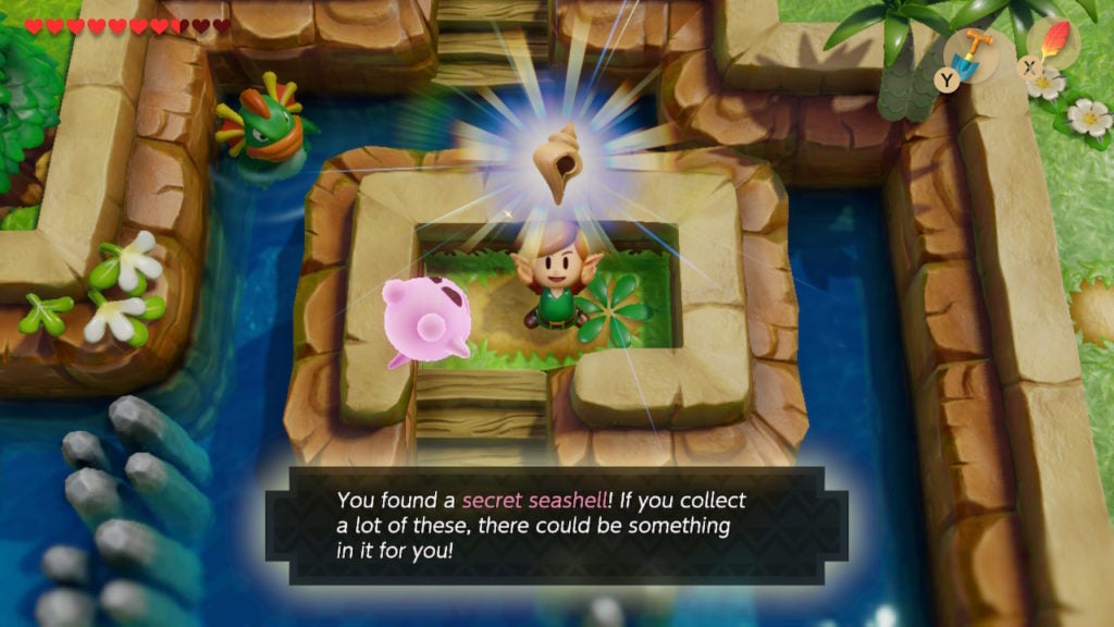 Link holding up a secret seashell he found on a tiny island while the Pink Ghost watches.