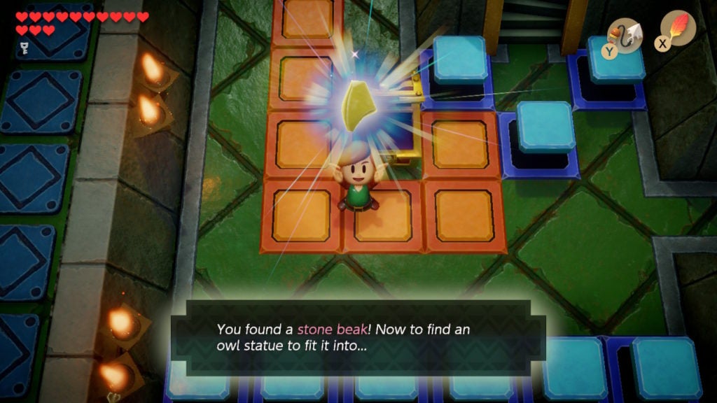 Link holding up a Stone Beak.