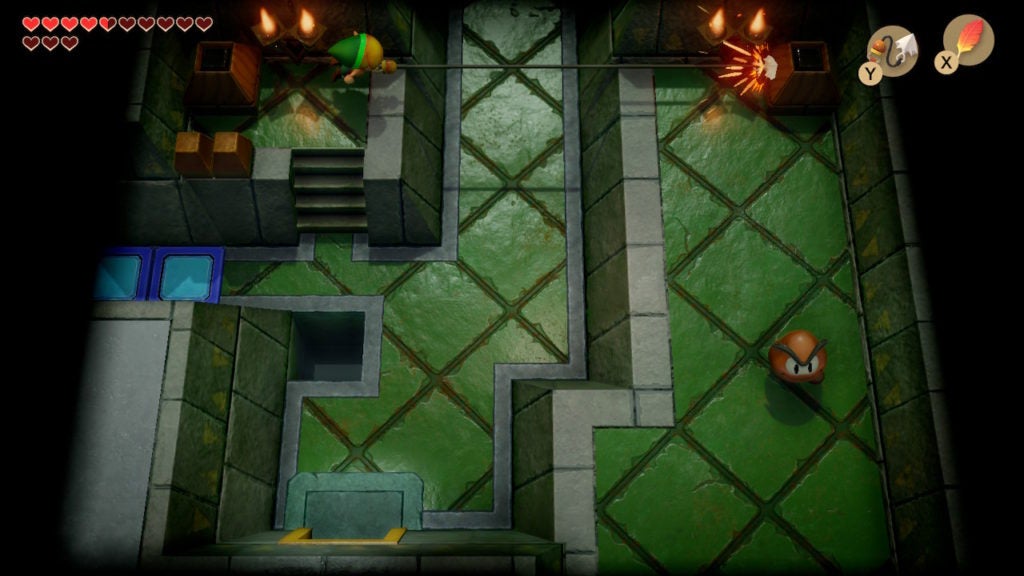 Link using the Hookshot to cross a room full of Goombas.