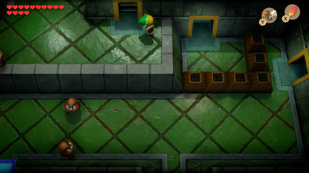 Link walking to ledge that leads to an open doorway to the east.