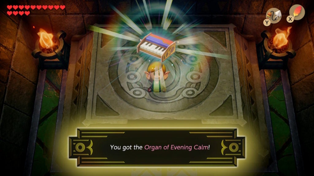 Link holding up the Organ of Evening Calm. The instrument is a keyboard with a vibrant orange and purple body lined with gold.
