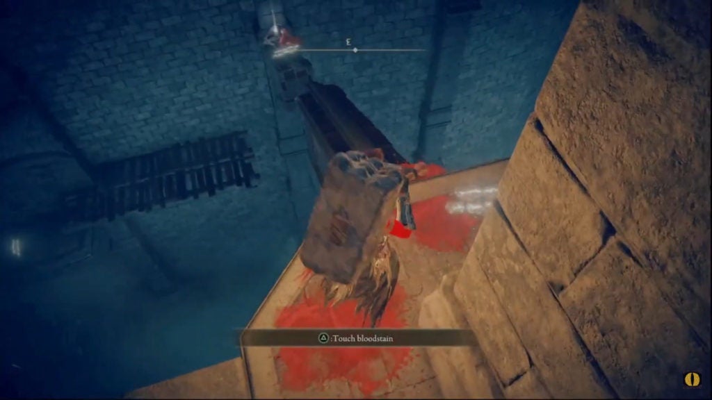 The player looking at an item across a broken walkway.