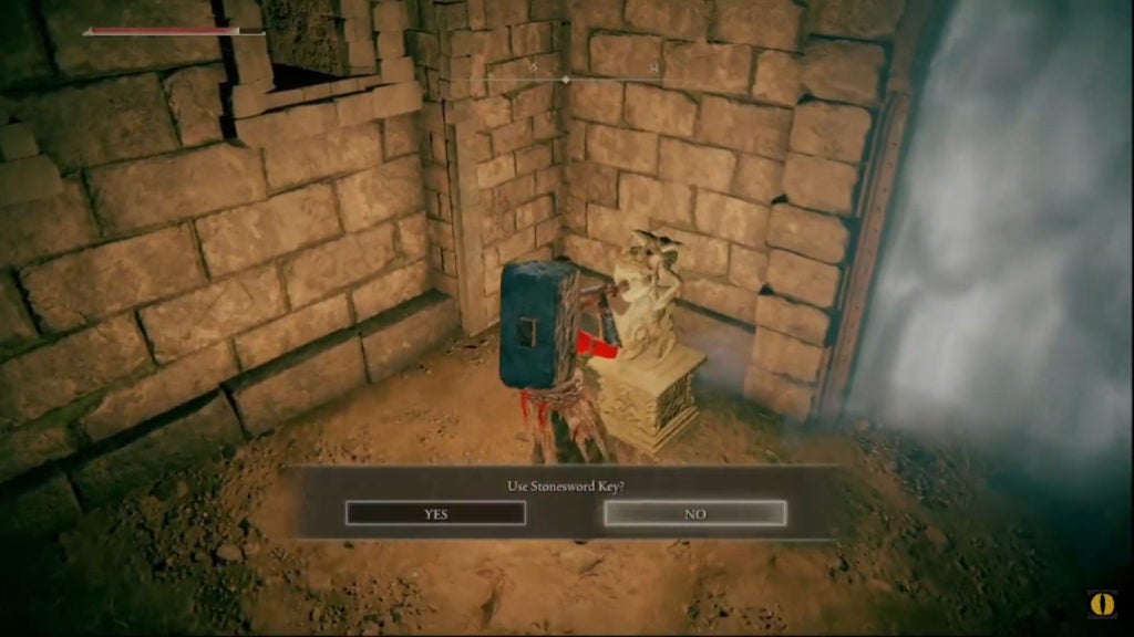 The player using a Stonesword Key on an imp statue to open a white fog gate.