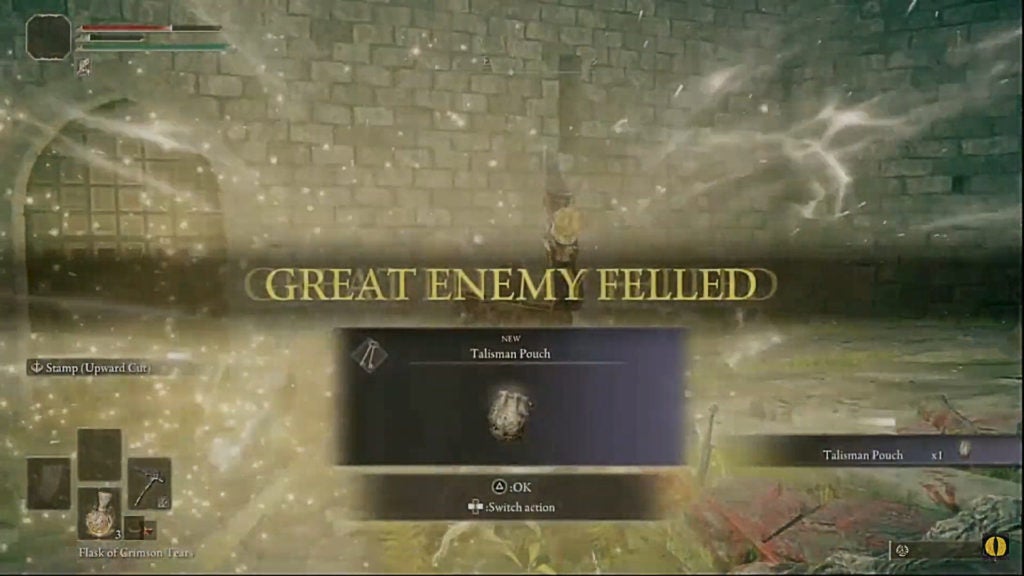 Margit, the Fell Omen dying and turning into golden sparks as text that reads "great enemy felled" appears on the middle of the screen.