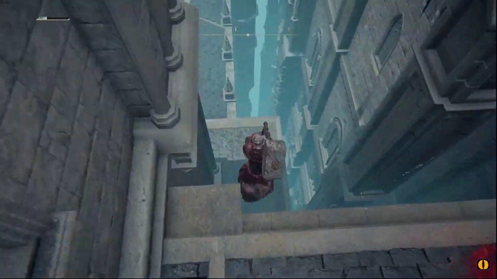 The player dropping down a ledge towards the east.